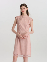 a lady in a light pink lace cheongsam qipao mini dress